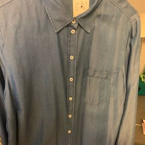 Men’s blue soft material dress shirt. Never worn labels are still attached.